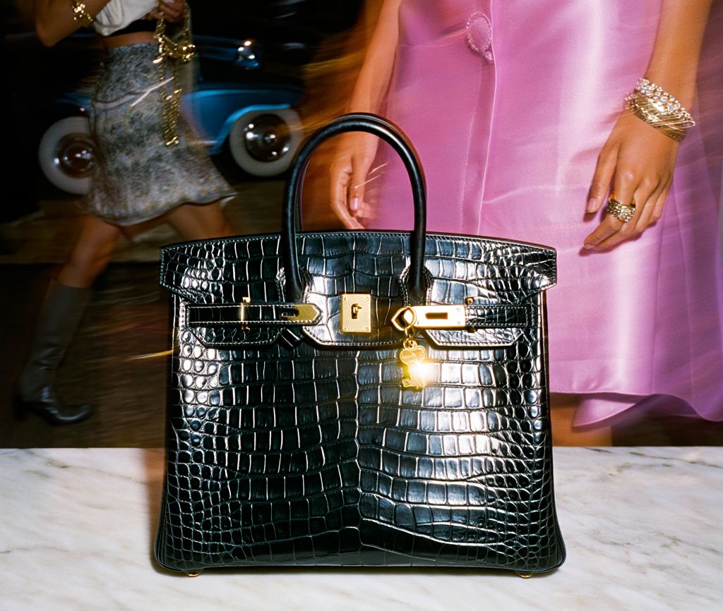 The world’s most coveted luxury bags—Chanel, Hermès, Louis Vuitton, Gucci—curated in one place at AUTHENTIQUE LUXURY. A woman of color smiles as she explores our exclusive collection, joined by women of all races united by their love of timeless style. From vintage classics to rare limited editions, each bag is authenticated and ready to be yours. With our Reserve Program, dream bags are now within reach. Discover pre-owned designer luxury, elevated.