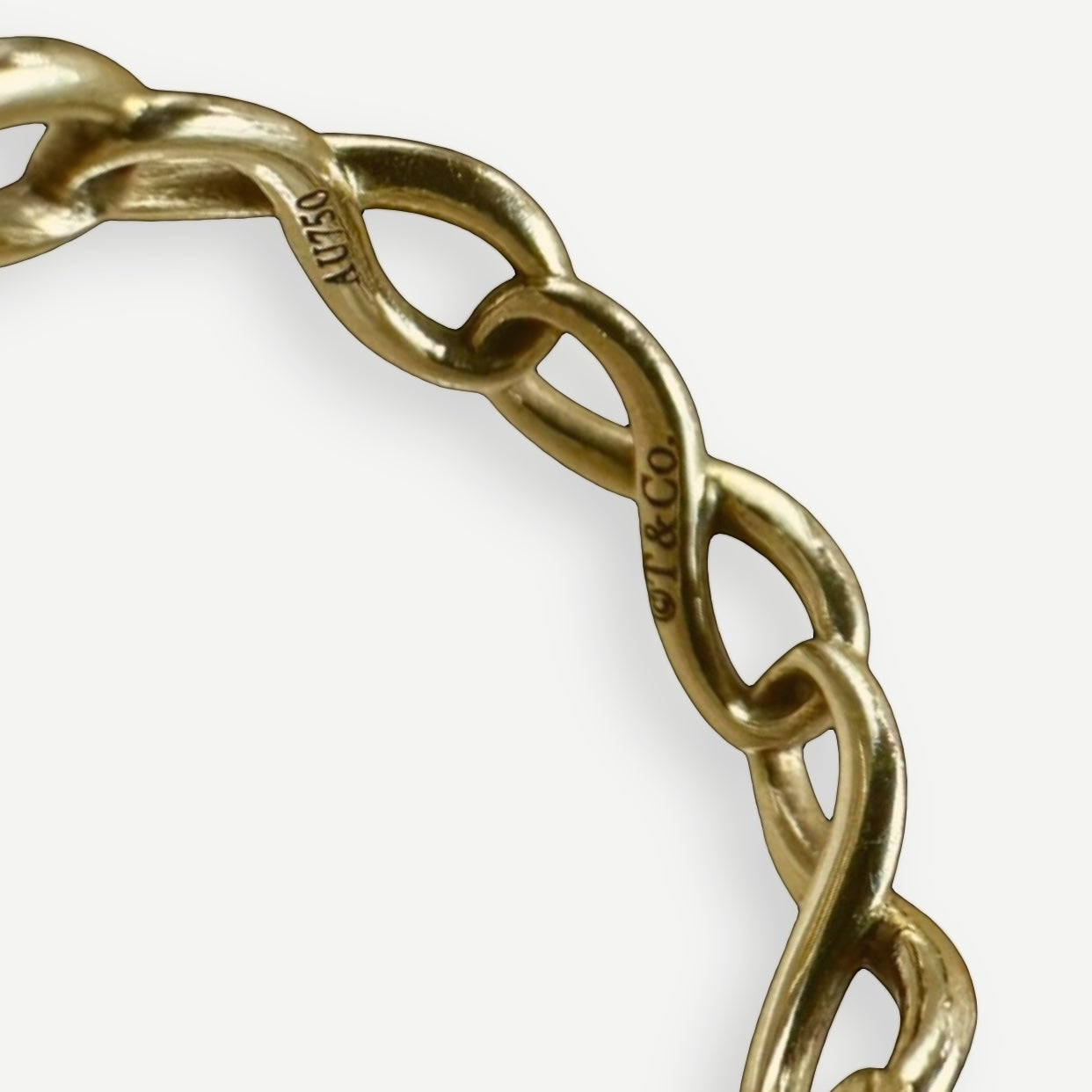 Tiffany & Co. Infinity Ring, 18K Yellow Gold, US Size 4.5 | Shop Authentique Lux