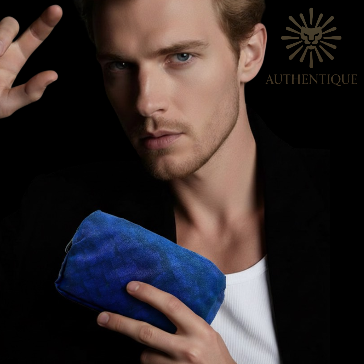 Model holding Bottega Veneta Intrecciolusion Pouch in Navy Blue Nylon with Printed Intrecciato Weave and Leather Pull Tab