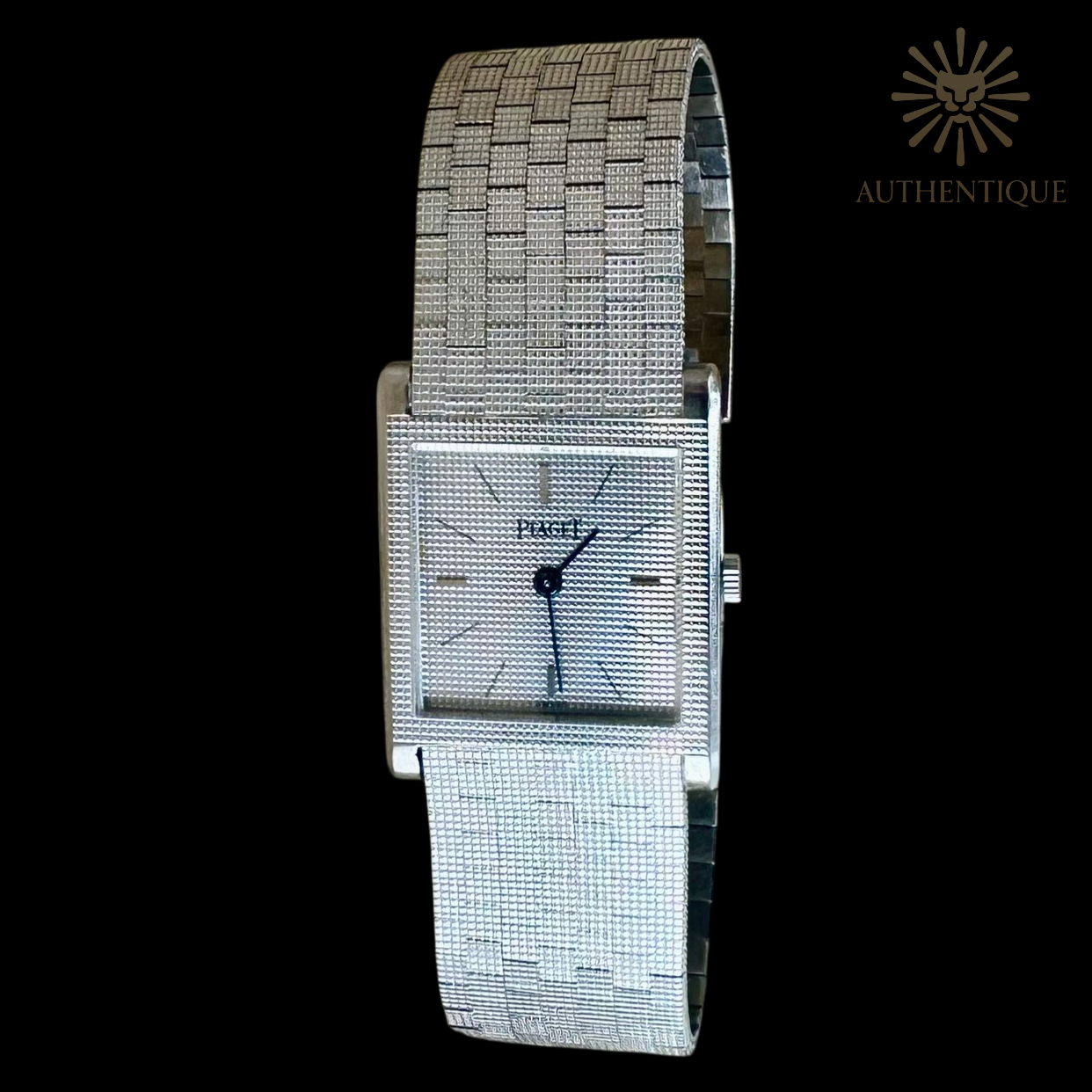 Piaget Vintage Protocole 9151B11 in 18k White Gold with "Clous de Paris" Hobnail Bezel and Silver Sunray Dial.