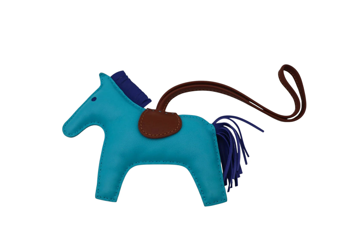 HERMÈS Rodeo MM Bag Charm, Bleu Azteque, Fauve and Bleu Électrique | Shop Authentique Lux