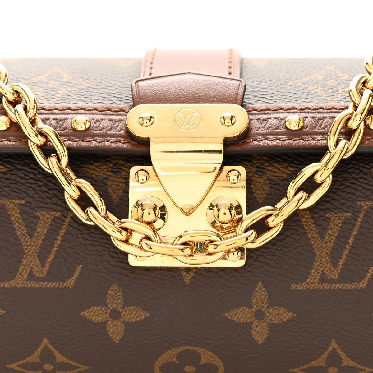 LOUIS VUITTON Papillon Trunk gold-tone clasp and chain close-up | Shop Authentique Lux