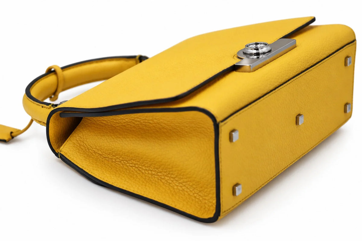 Moynat yellow leather bag base and metal feet | Shop Authentique Lux