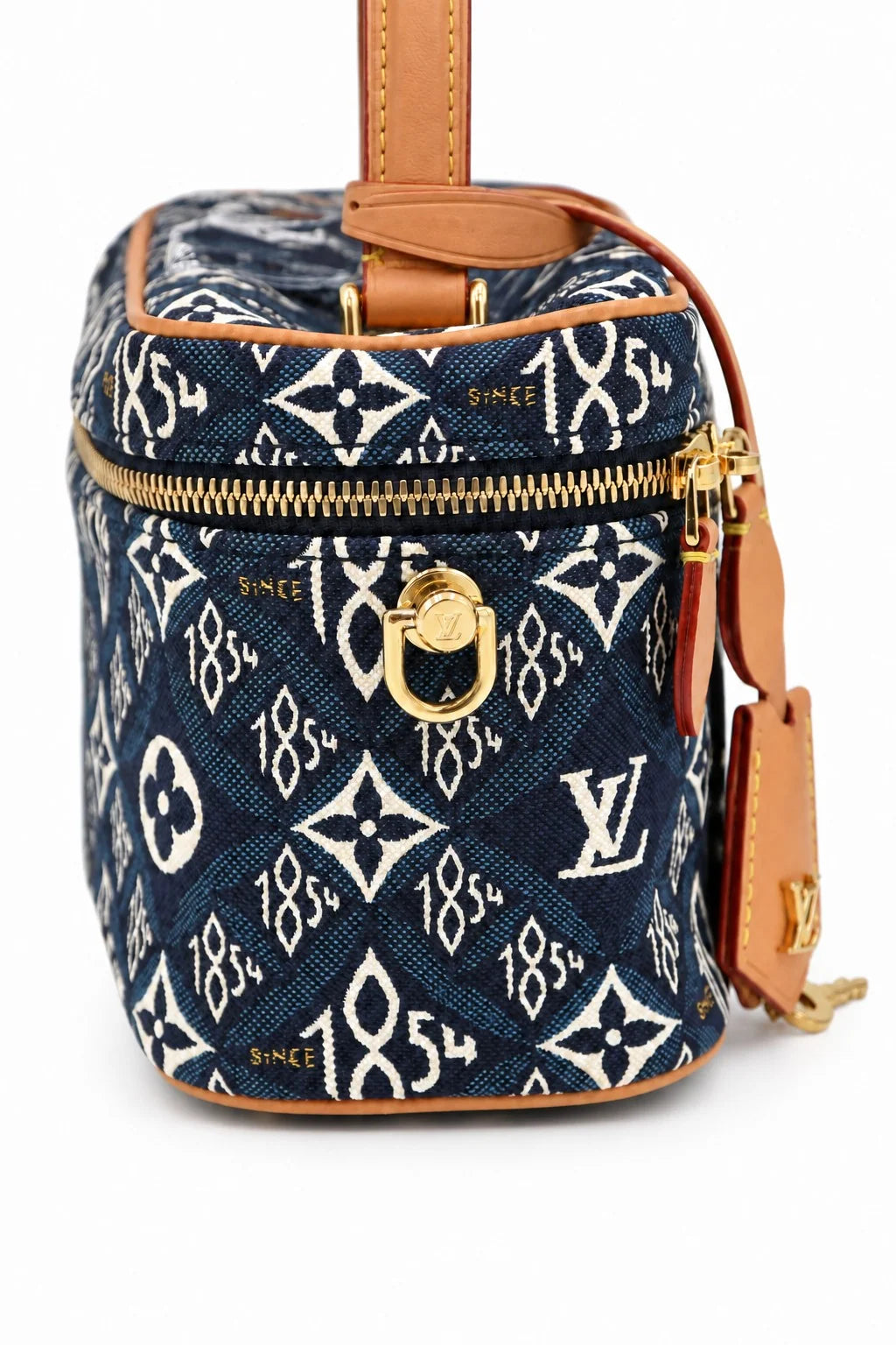 Louis Vuitton blue Since 1854 Monogram denim Vanity bag front view | Shop Authentique Lux