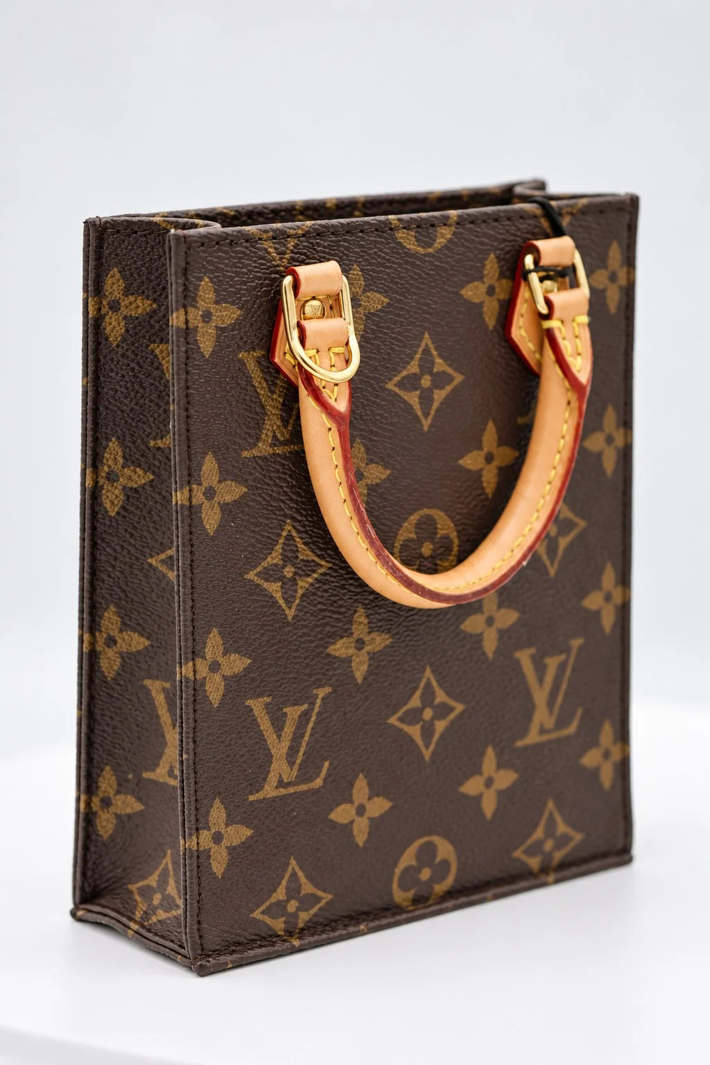 Louis Vuitton Petit Sac Plat brown Monogram canvas front view | Shop Authentique Lux