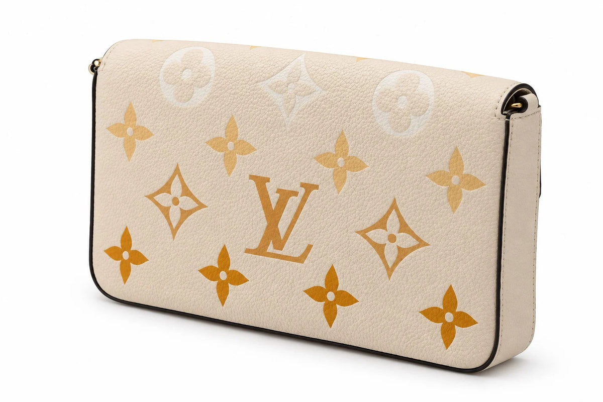 Louis Vuitton Pochette Félicie Cream Saffron Monogram Giant Empreinte front | Shop Authentique Lux