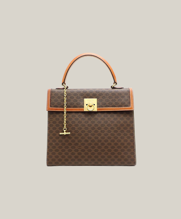 Celine Macadam Blazon top handle bag vintage, visible handle leather wear, good overall condition Authentique Luxury.
Vintage Celine Macadam monogram satchel with minor leather handle flaw.