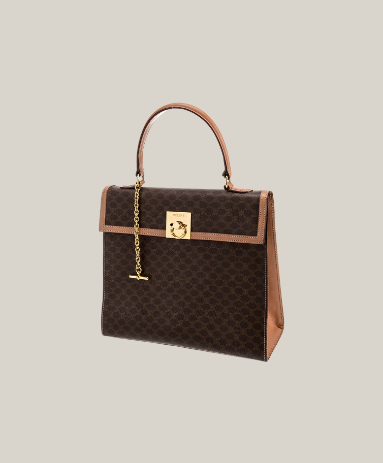 Celine Macadam Blazon top handle bag vintage, visible handle leather wear, good overall condition Authentique Luxury.
Vintage Celine Macadam monogram satchel with minor leather handle flaw.