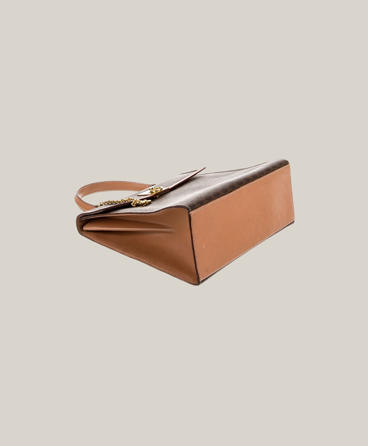 Celine Macadam Blazon top handle bag vintage, visible handle leather wear, good overall condition Authentique Luxury.
Vintage Celine Macadam monogram satchel with minor leather handle flaw.
