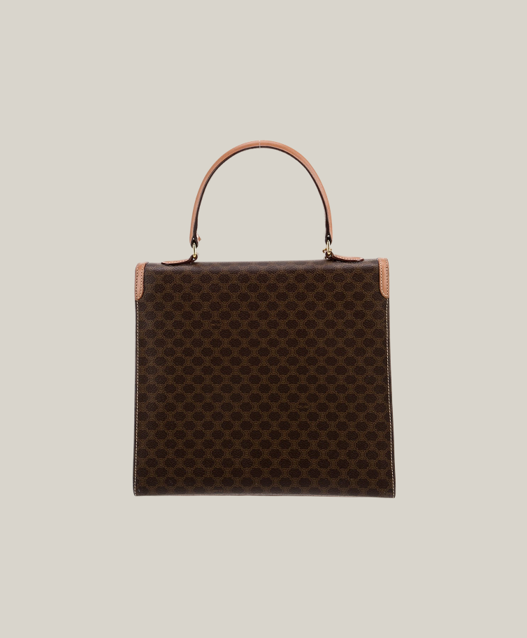 Celine Macadam Blazon top handle bag vintage, visible handle leather wear, good overall condition Authentique Luxury.
Vintage Celine Macadam monogram satchel with minor leather handle flaw.