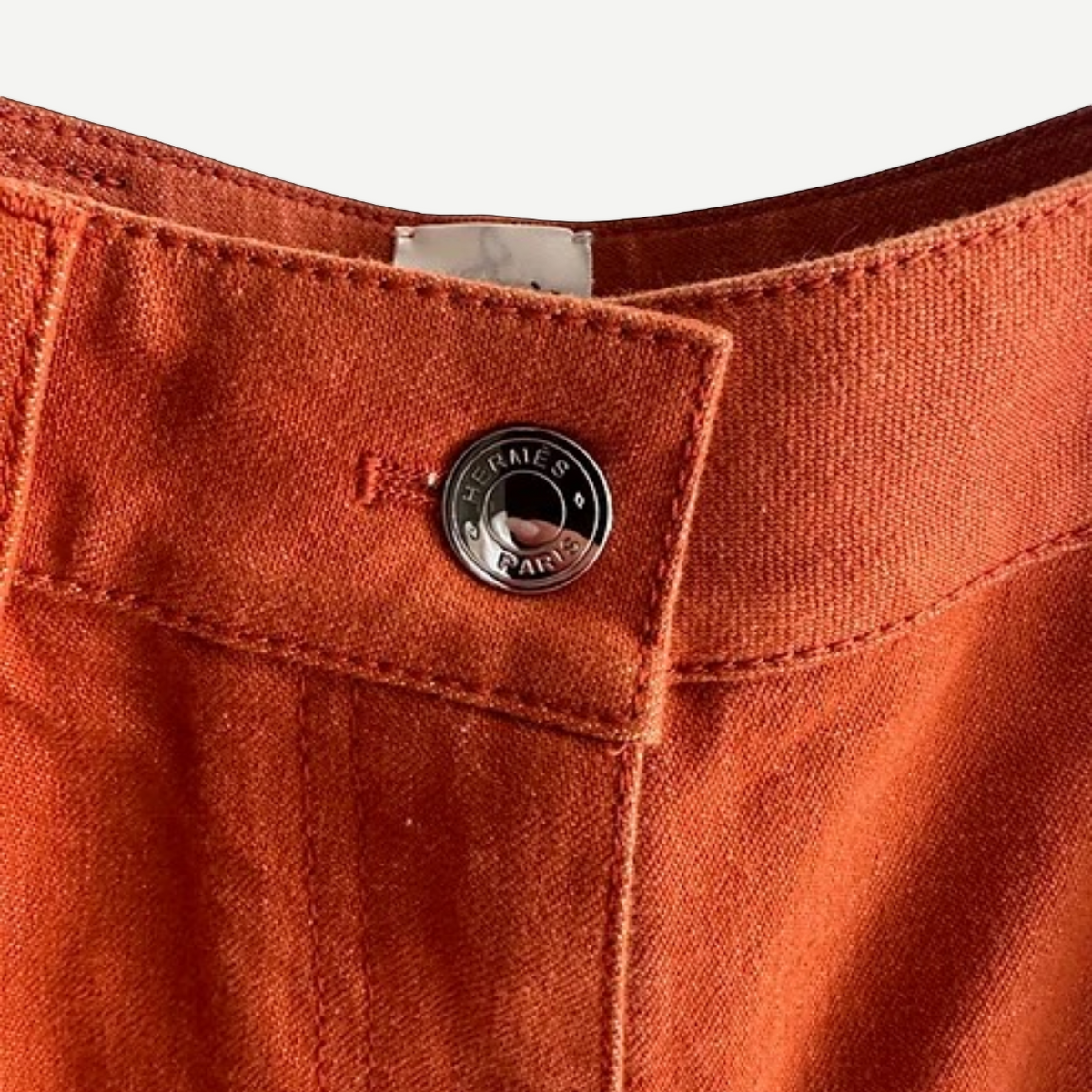 HERMÈS Orange Stretch Denim Shorts, Engraved Button Detail | Shop Authentique Lux