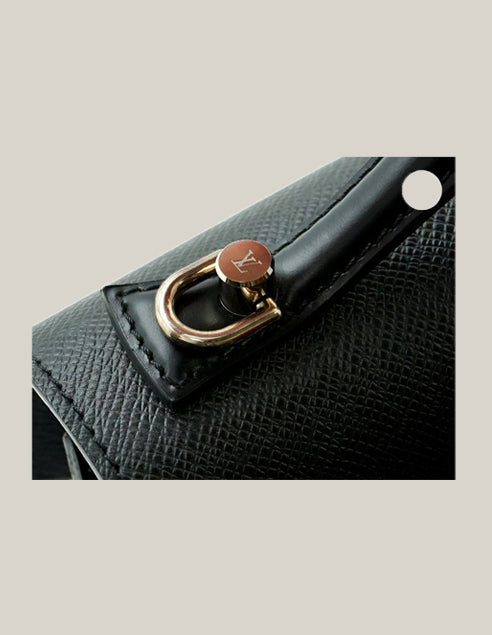 Louis Vuitton Taiga Leather Monceau Bag - Authentique Luxury | 100% Authentic Louis Vuitton Bag