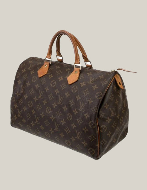 Louis Vuitton Speedy 35 with lock - Authentique Luxury | 100% Authentic Louis Vuitton Bag