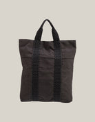 “Hermès Toile Herline Cabas tote black canvas very good condition web handles authentic”
“Hermès Authentique Luxury black canvas Herline Cabas tote front details”