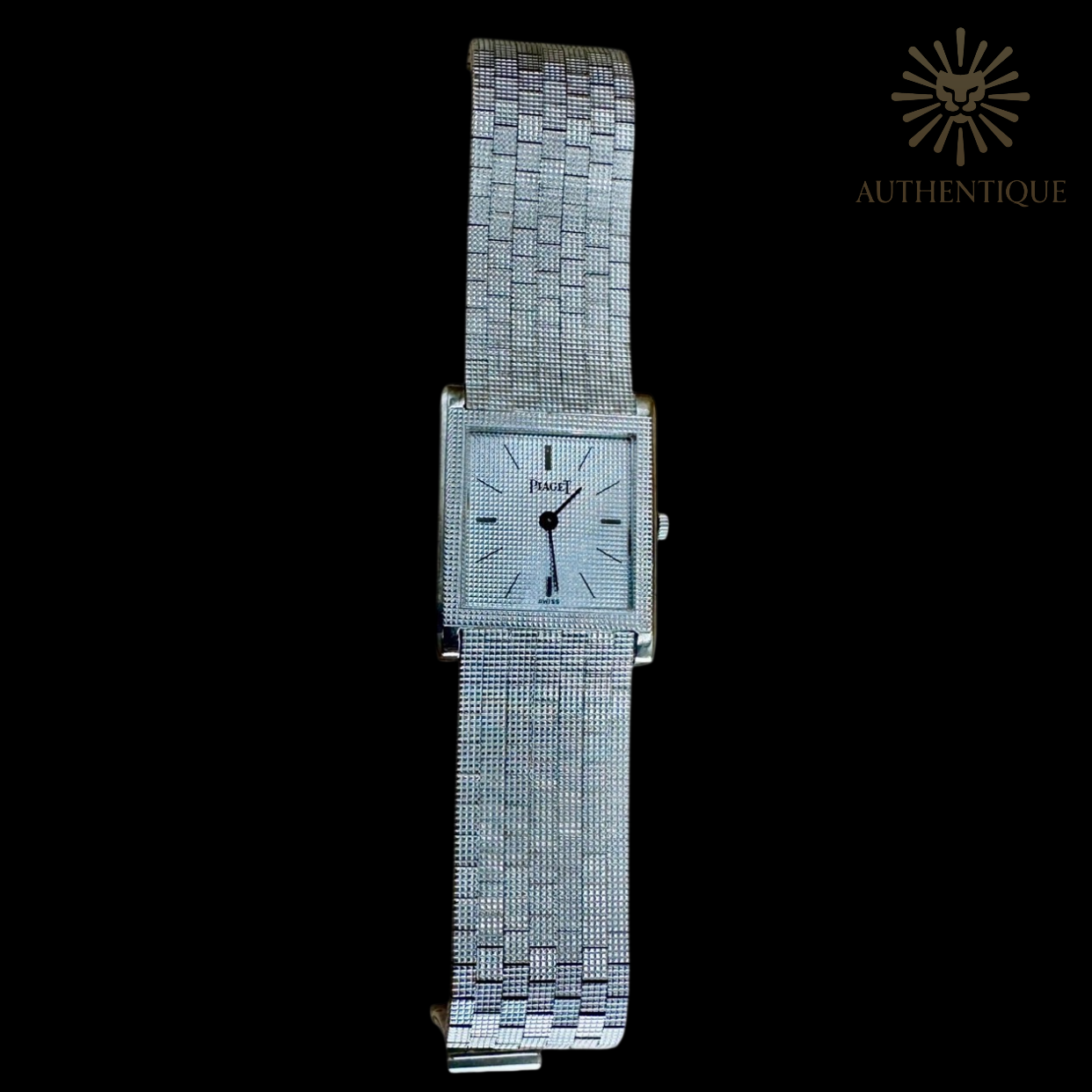 Piaget Vintage Protocole 9151B11 in 18k White Gold with "Clous de Paris" Hobnail Bezel and Silver Sunray Dial.