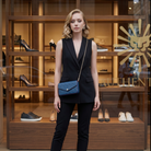 Model wearing Louis Vuitton Marine Rouge Empreinte Pochette Felicie Chain Wallet - 2-Piece Set