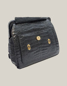 “Valentino Garavani vintage alligator top handle bag authentic Italian exotic luxury”
“Close-up alligator skin detail vintage Valentino Garavani collectible handbag”