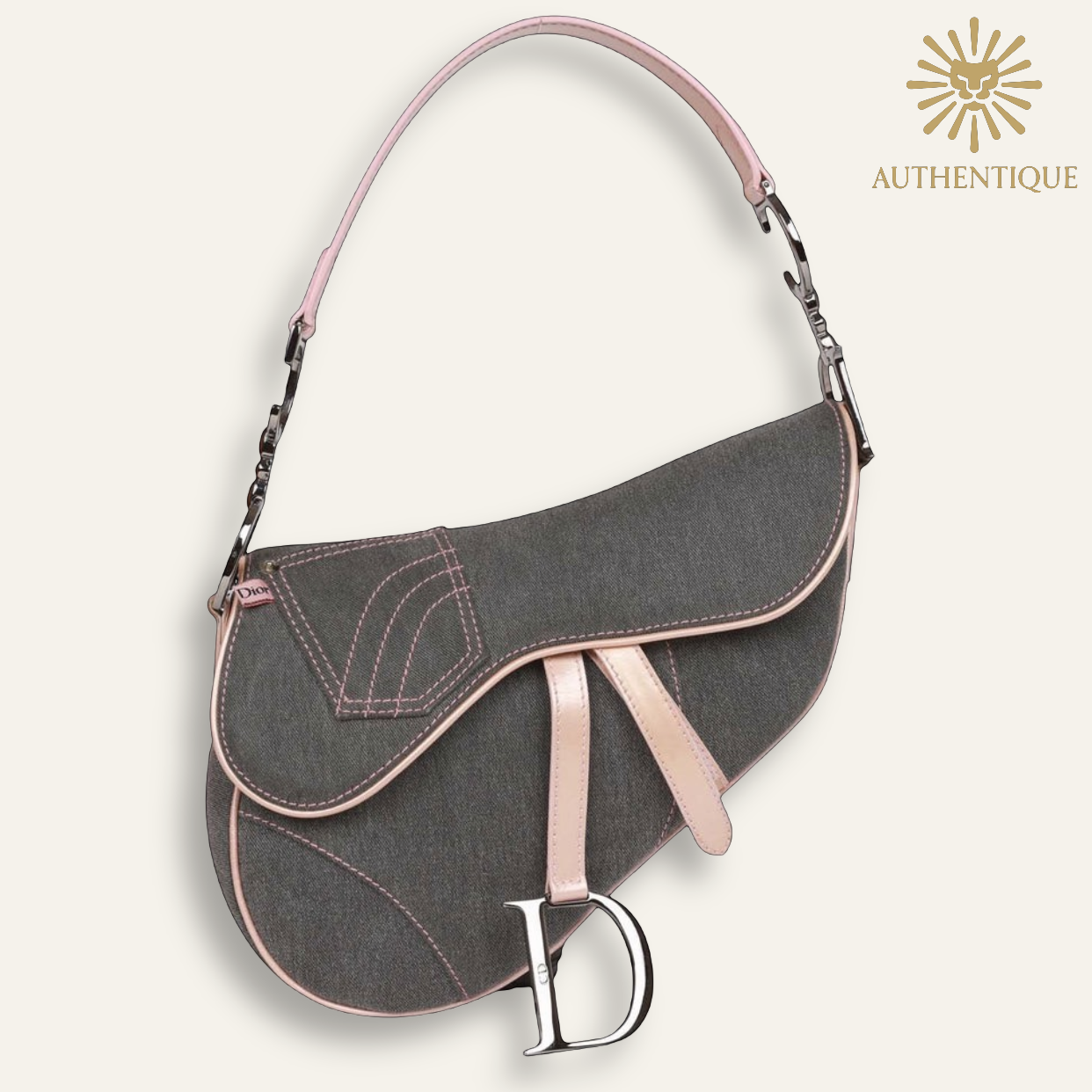 Vintage Christian Dior Saddle Bag in blue denim with pink patent leather trim and silver-tone 'D' charm hardware. Shop Authentique Lux