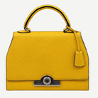 Moynat structured top handle bag yellow leather front view | Shop Authentique Lux
