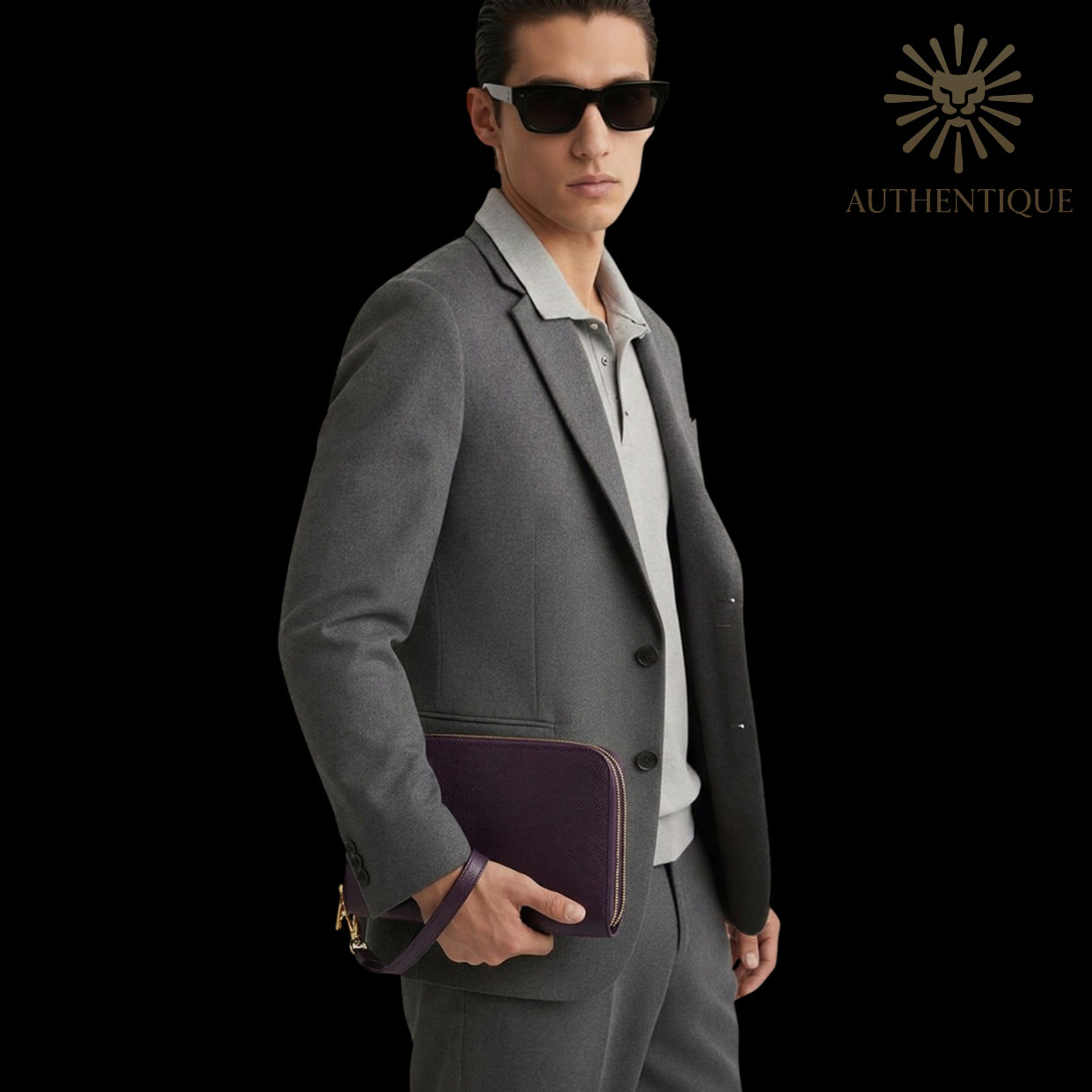 Man holding a Louis Vuitton Taiga Pouch Baikal – Burgundy (Acajou)