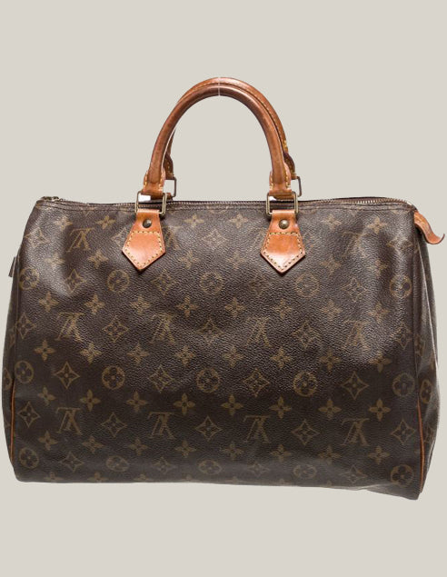 Louis Vuitton Speedy 35 with lock - Authentique Luxury | 100% Authentic Louis Vuitton Bag