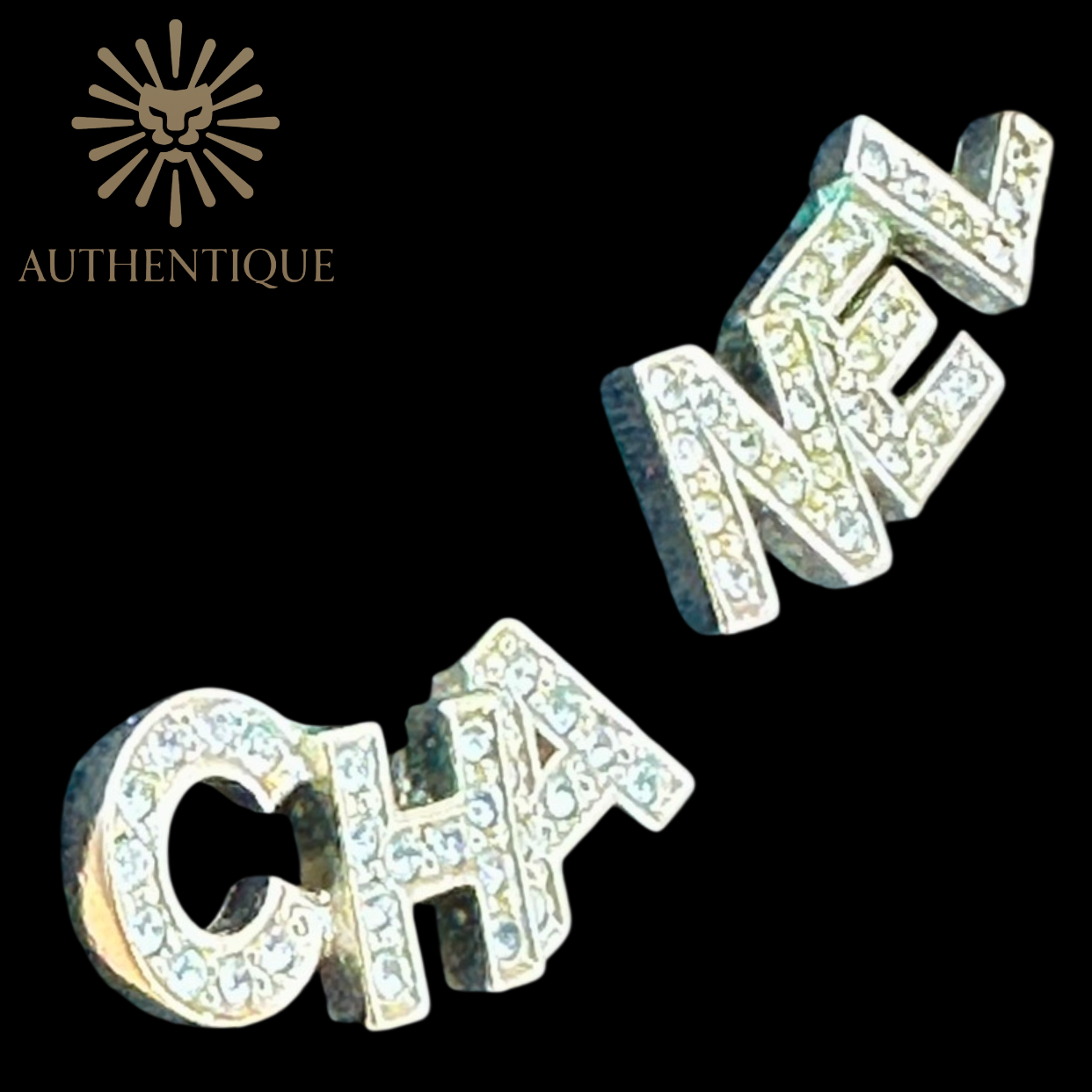 Chanel 2022 Strass 'CHA-NEL' Stud Earrings in Gold-Plated Metal with Crystal Embellishments.