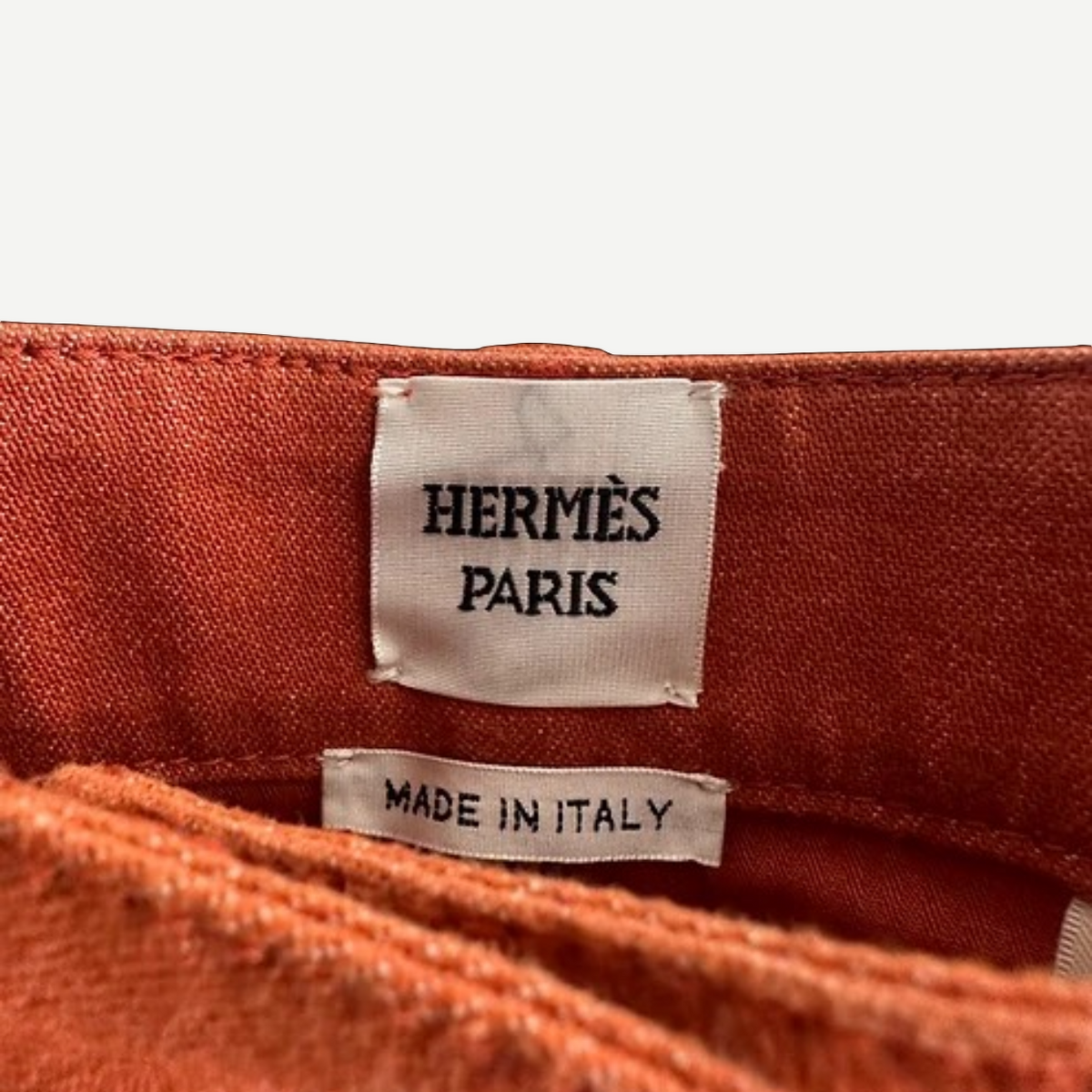 HERMÈS Orange Stretch Denim Shorts, Rear Pocket Detail | Shop Authentique Lux