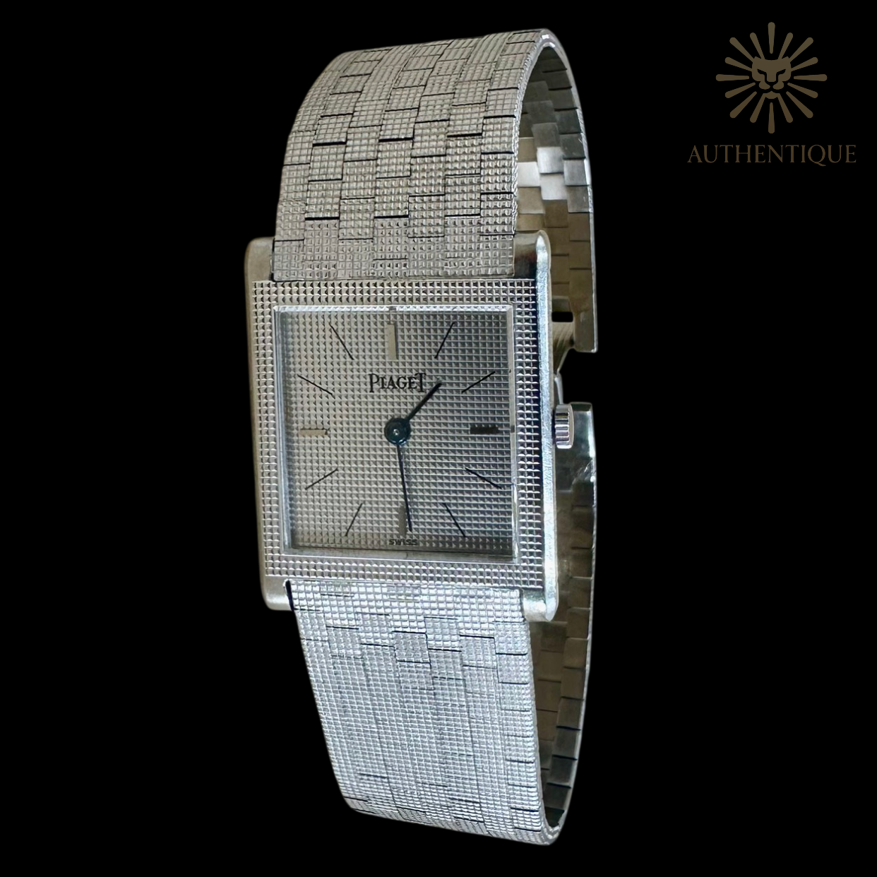 Piaget Vintage Protocole 9151B11 in 18k White Gold with "Clous de Paris" Hobnail Bezel and Silver Sunray Dial.