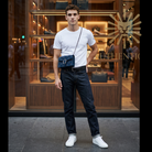 Model wearing Gucci Dionysus Mini Chain Wallet in Navy Blue Velvet Crystal GG – Available at Authentique Lux