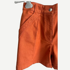 HERMÈS Orange Stretch Denim Shorts, Composition Label | Shop Authentique Lux