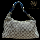 Gucci GG Canvas Horsebit Hobo in neutral monogram canvas with gold-tone hardware — Always guaranteed authentic at Authentique Lux