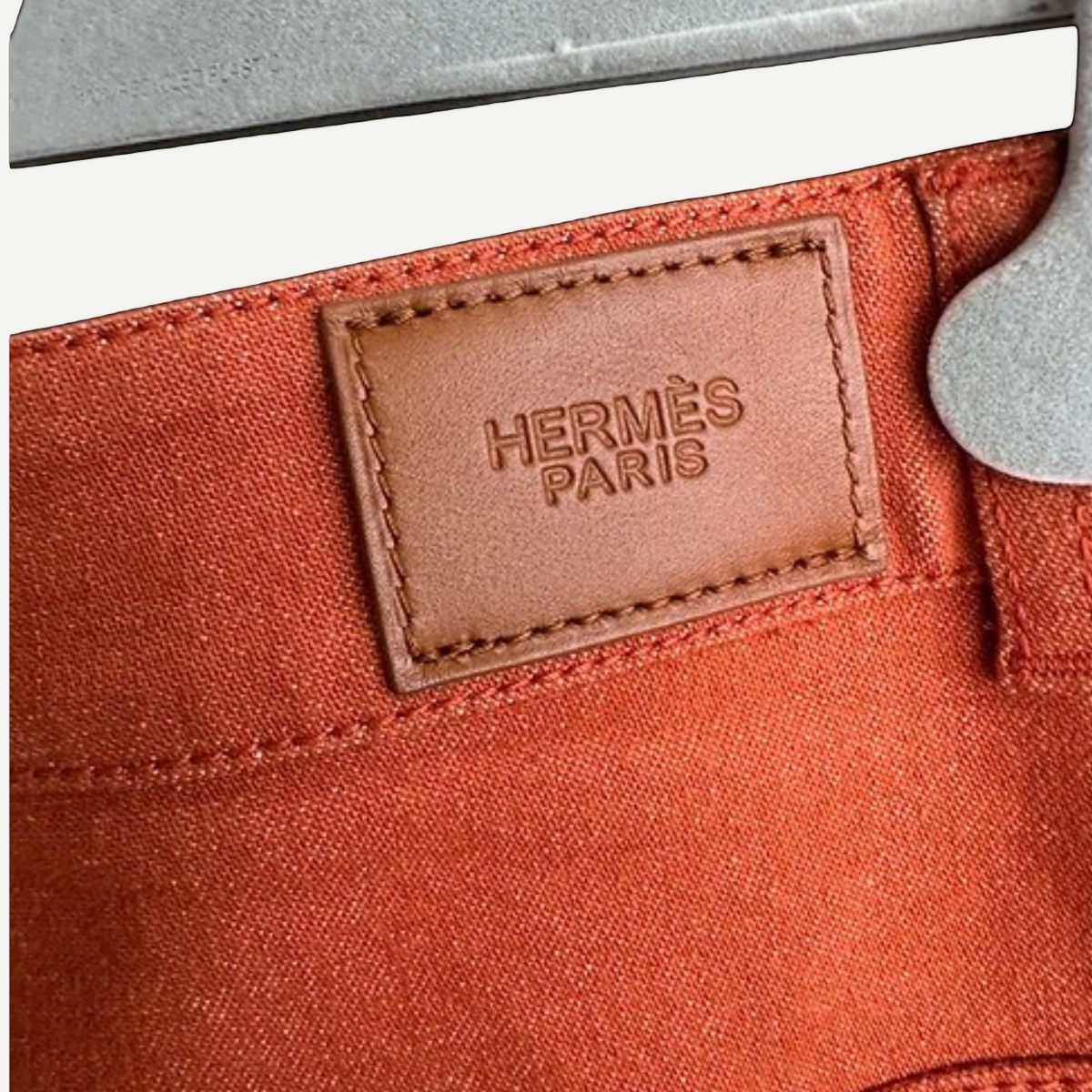 HERMÈS Orange Stretch Denim Shorts, Back View | Shop Authentique Lux