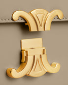 CELINE Medium Triomphe Shoulder Bag, Beige Shiny Calfskin, Gold Hardware | Shop Authentique Lux