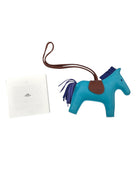 HERMÈS Rodeo MM Bag Charm, Bleu Azteque, Fauve and Bleu Électrique | Shop Authentique Lux