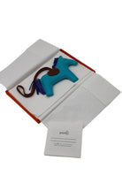 HERMÈS Rodeo MM Bag Charm, Bleu Azteque, Fauve and Bleu Électrique | Shop Authentique Lux