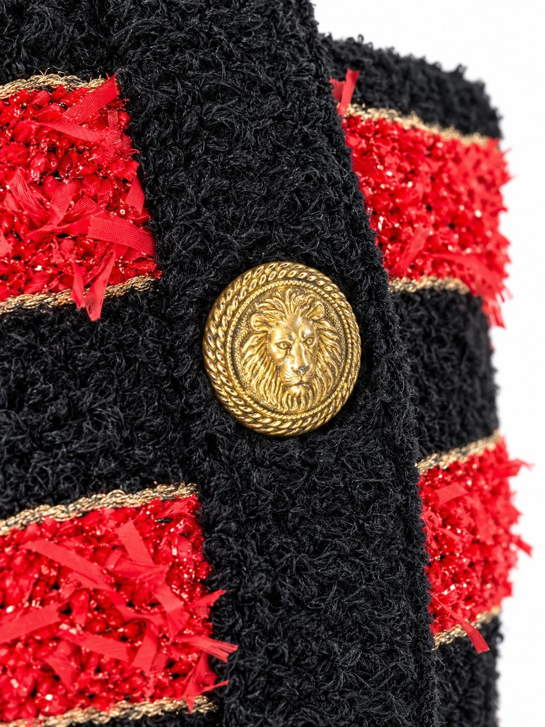BALMAIN striped knit jacket with gold-tone buttons, angled front view | Shop Authentique Lux