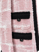 CHANEL Globe Collection tweed jacket, angled front view | Shop Authentique Lux