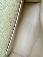 HERMÈS Beton ostrich Kelly Pochette, opposite side and gusset detail | Shop Authentique Lux
