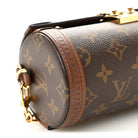 LOUIS VUITTON Papillon Trunk circular end and embossed leather band detail | Shop Authentique Lux