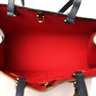 LOUIS VUITTON OnTheGo MM caramel Reverse canvas side with shoulder strap | Shop Authentique Lux