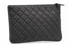 CHANEL black quilted caviar leather O-Case clutch back view | Shop Authentique Lux