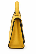 Moynat yellow leather top handle bag gusseted side | Shop Authentique Lux