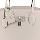 Louis Vuitton Milla MM silver-tone padlock and hanging leather tag | Shop Authentique Lux