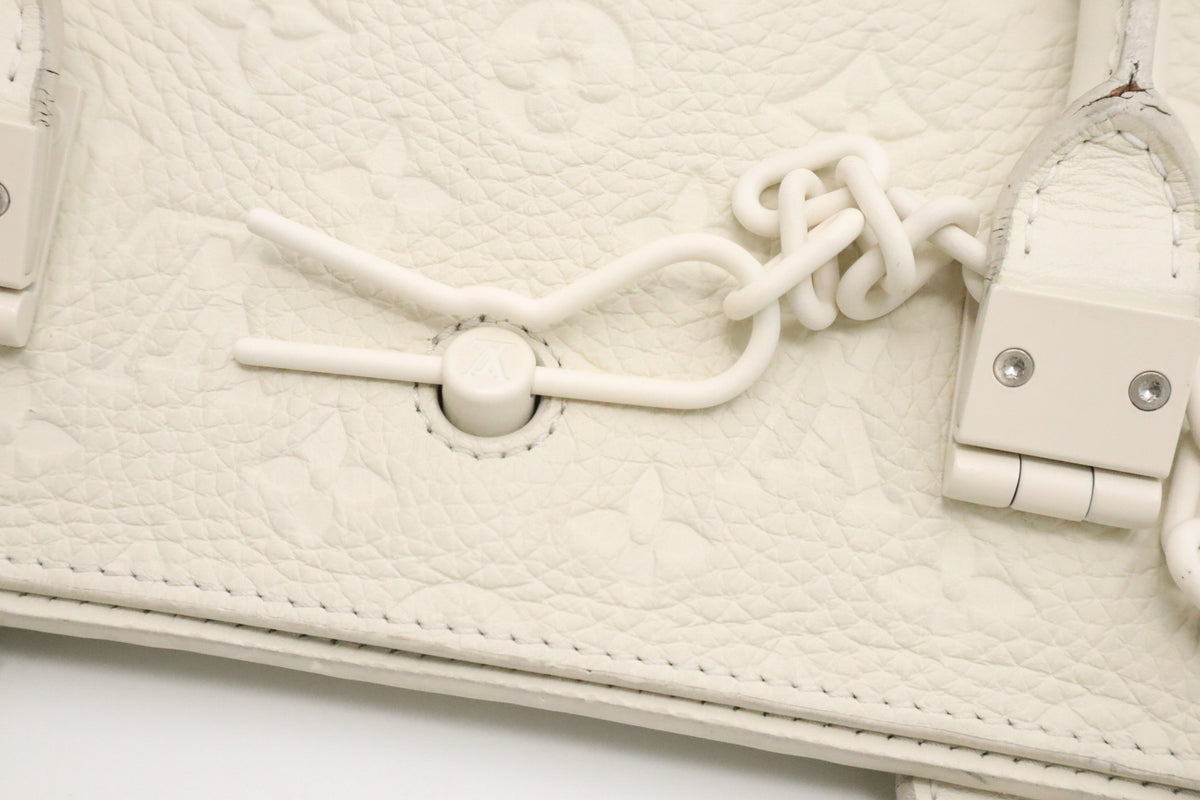 Louis Vuitton Sac Plat ivory leather handle detail | Shop Authentique Lux