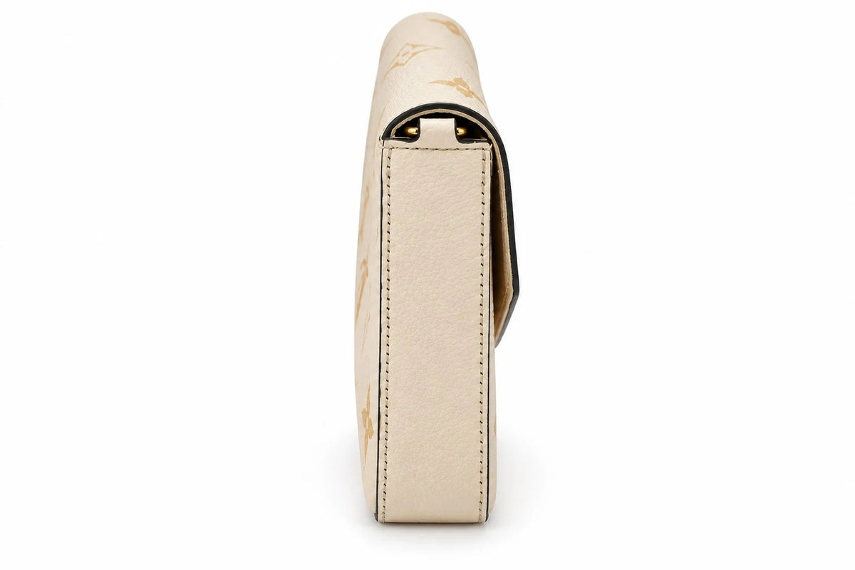 Louis Vuitton Pochette Félicie gold-tone chain clasp detail | Shop Authentique Lux